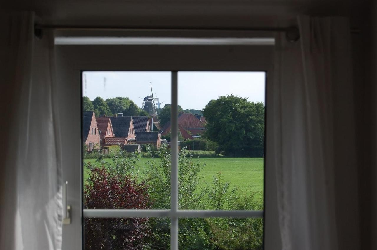 Ferienwohnung Im Gulfhof Krummhörn Екстериор снимка